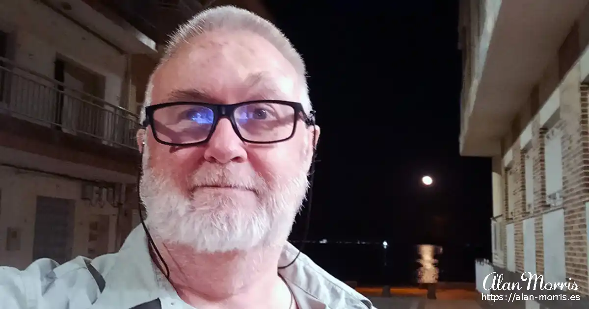 Alan Morris in Los Alcazares with the moonlight over the Mar Menor.